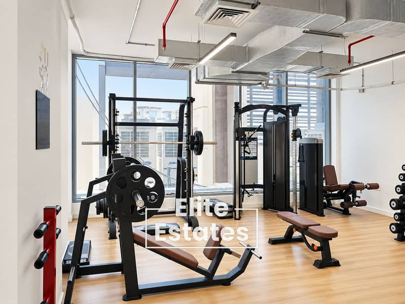 15 Modern Gym Interior with City Views. png