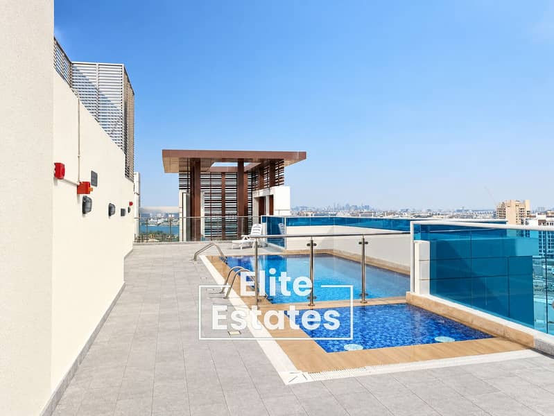 18 Modern Rooftop Pool Overlooking the City. png