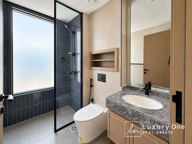 12 Modern Charcoal and Wood Bathroom. png