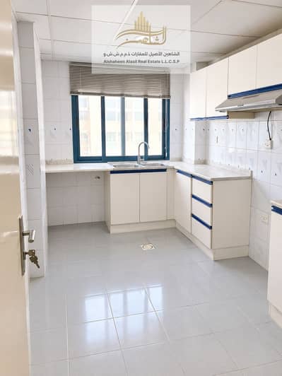 2 habitaciones Apartamento para en Alquiler en Al Majaz, Sharjah - Bright Modern U-Shaped Kitchen Interior. png 2 habitaciones Apartamento para en Alquiler en Al Majaz, Sharjah - Bright Modern U-Shaped Kitchen Interior. png