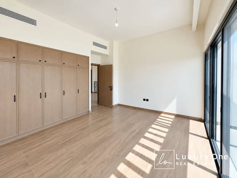 9 Sunlit Modern Empty Bedroom. png