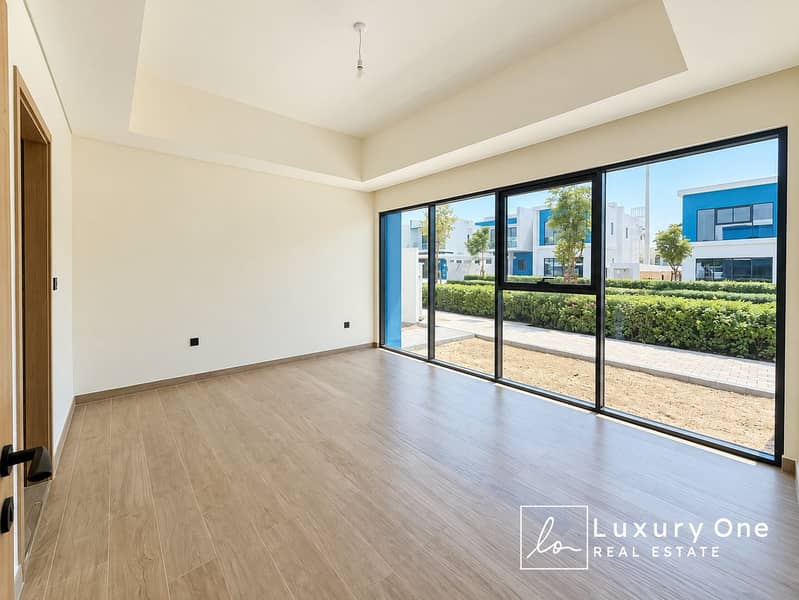 10 Sunlit Minimalist Room with Garden Views (1). png