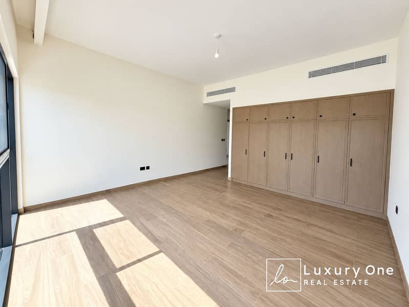 11 Bright Minimalist Bedroom with Built-In Wardrobe. png