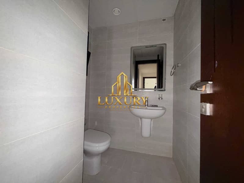 11 Elegant 1-Bedroom Apartment with Balcony & Closed Kitchen | Sarab, Aljada