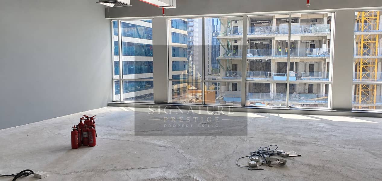 2 Daylit Unfinished Office with City Views. png