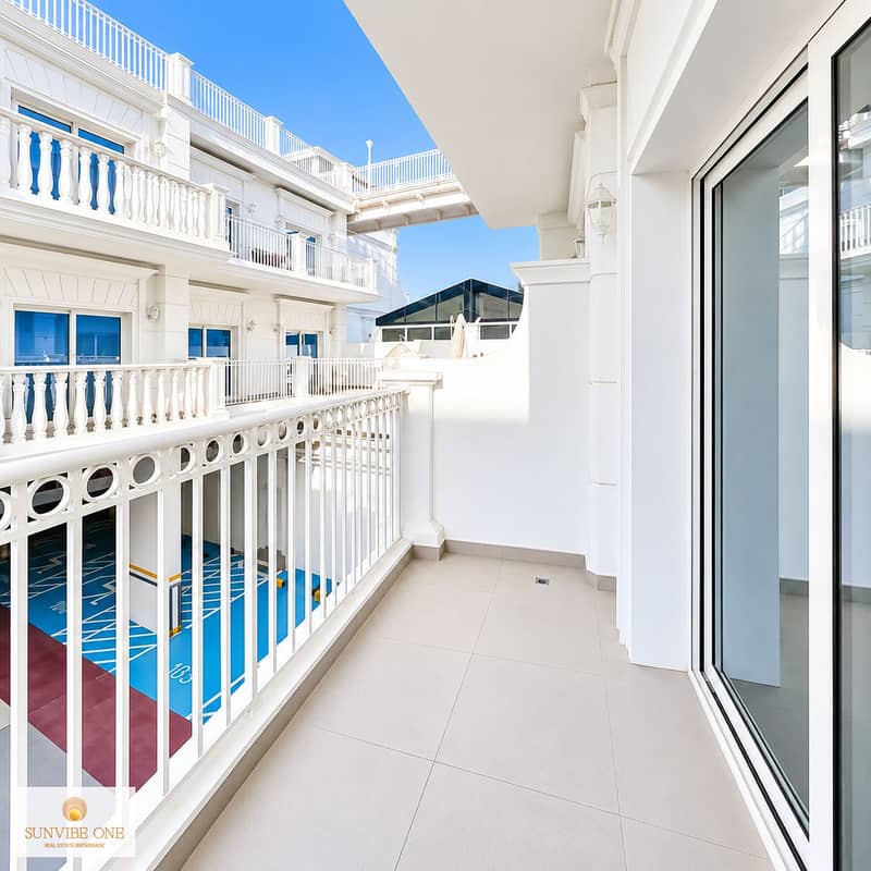 7 Sunlit White Balcony Courtyard. png