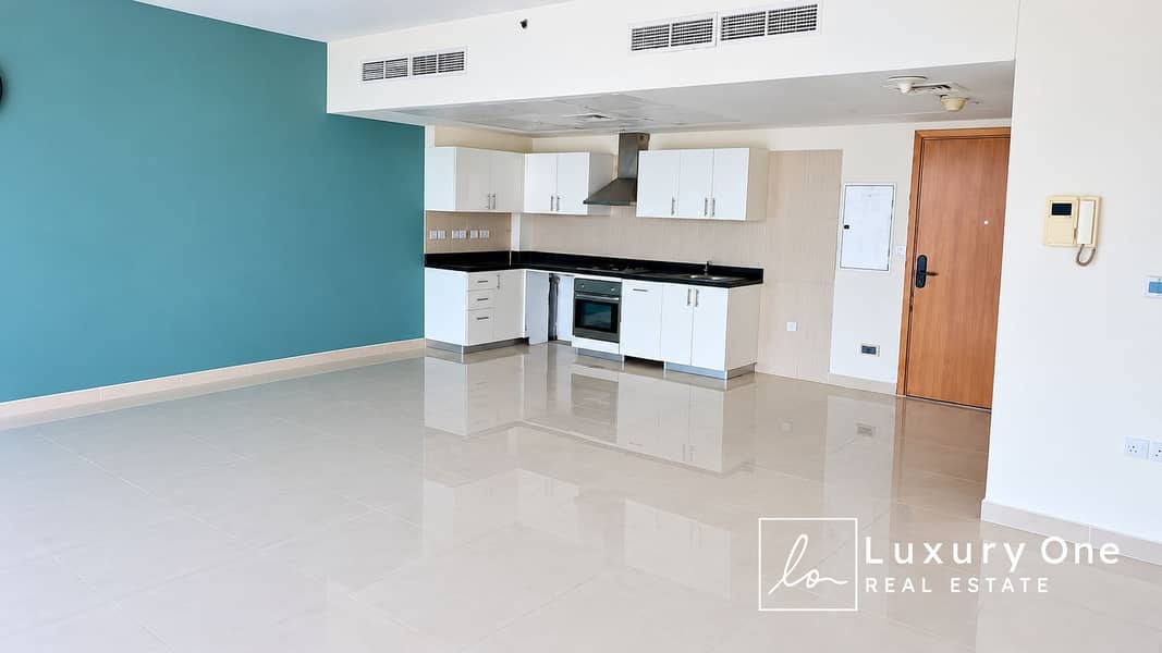 3 Modern Teal-Accented Apartment Interior. png