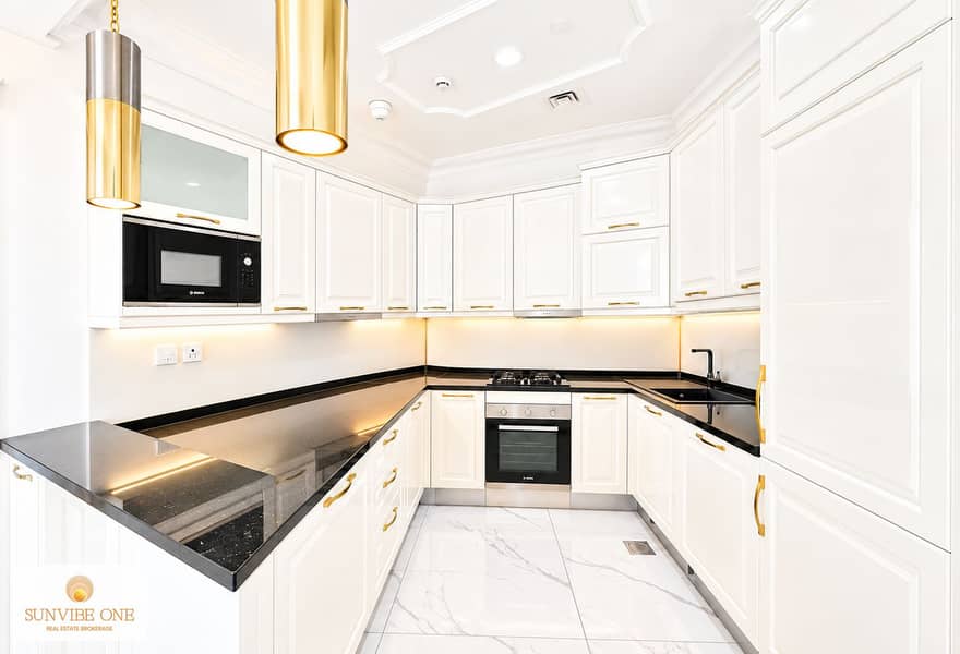 5 Elegant White Kitchen with Brass Accents. png