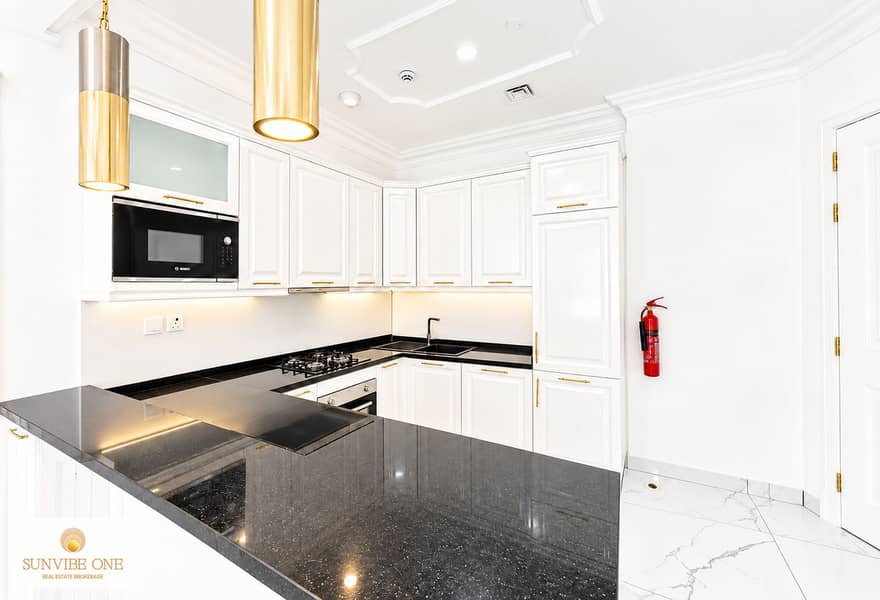 6 Bright White Kitchen with Gold Accents. png