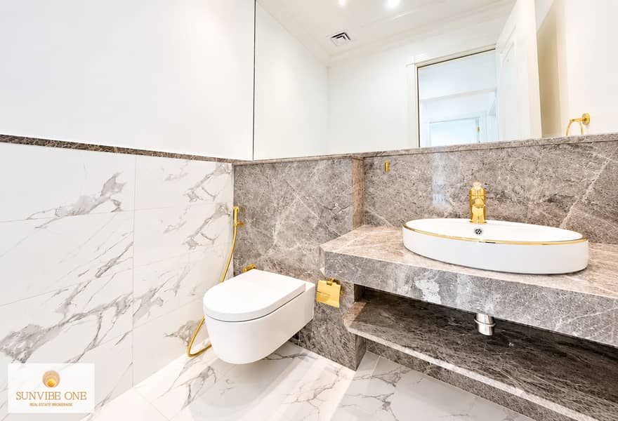 11 Brighter Marble and Gold Bathroom. png