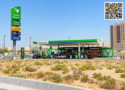 Building para en Venta en Al Alia, Ajman - Emarat Station by the Desert Road. png Building para en Venta en Al Alia, Ajman - Emarat Station by the Desert Road. png