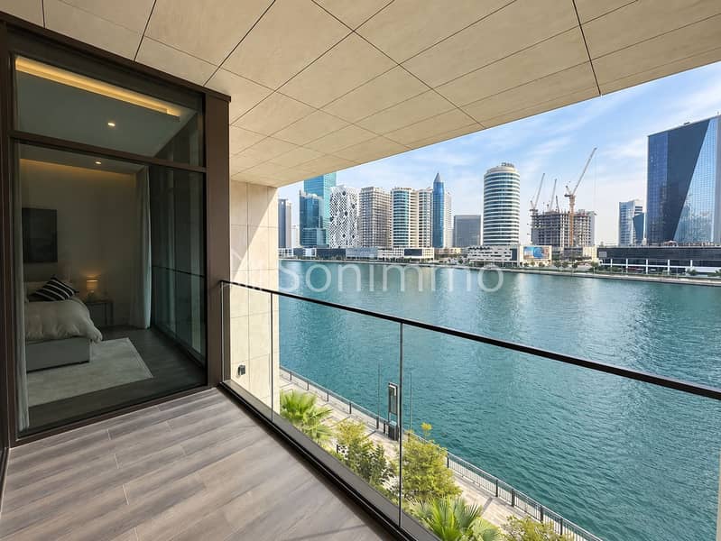 14 Modern Balcony Overlooking Waterfront Skyline. png
