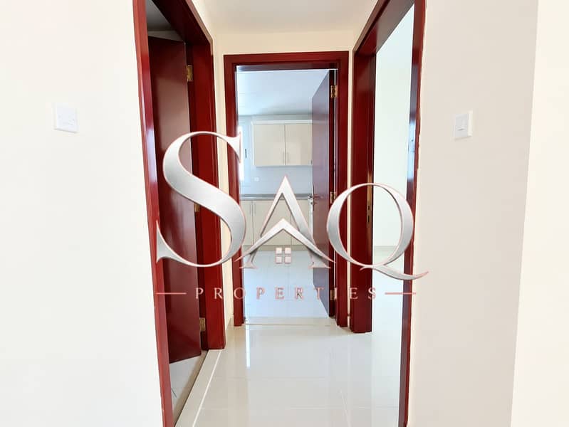 5 Modern Cream Hallway with Mahogany Doors. png