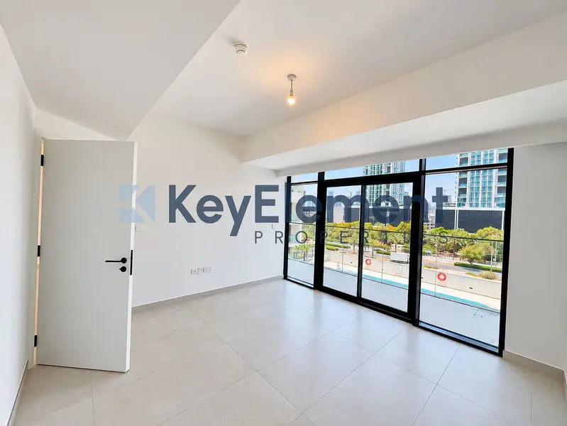 Pool View | Spacious Balcony | Modern Apartment