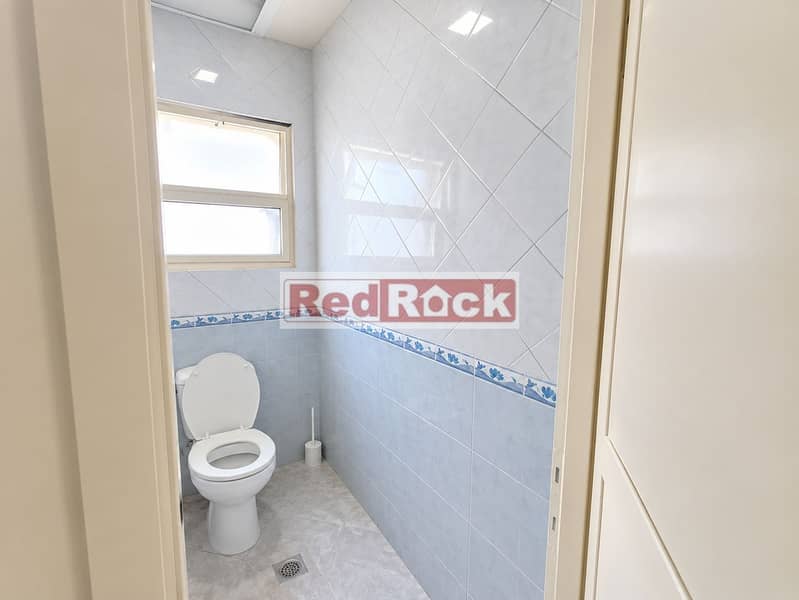 6 Bright Minimalist Tiled Bathroom. png