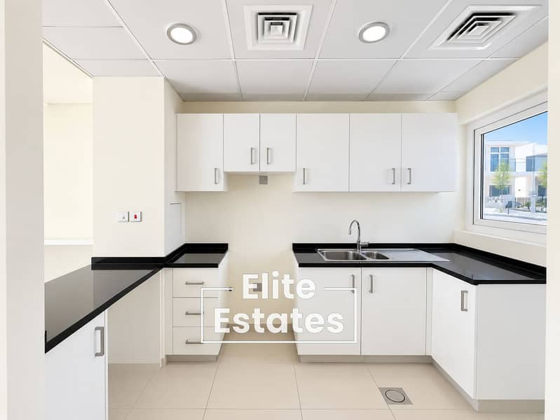 8 Modern Minimalist Kitchen with City View. png