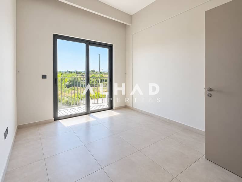 6 Bright Minimalist Bedroom with Balcony Views. png