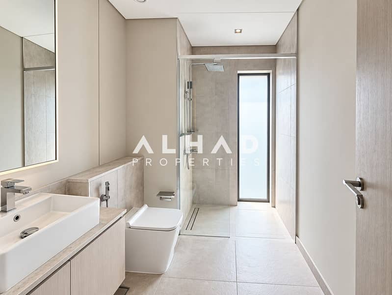 8 Minimalist Beige Stone Bathroom. png