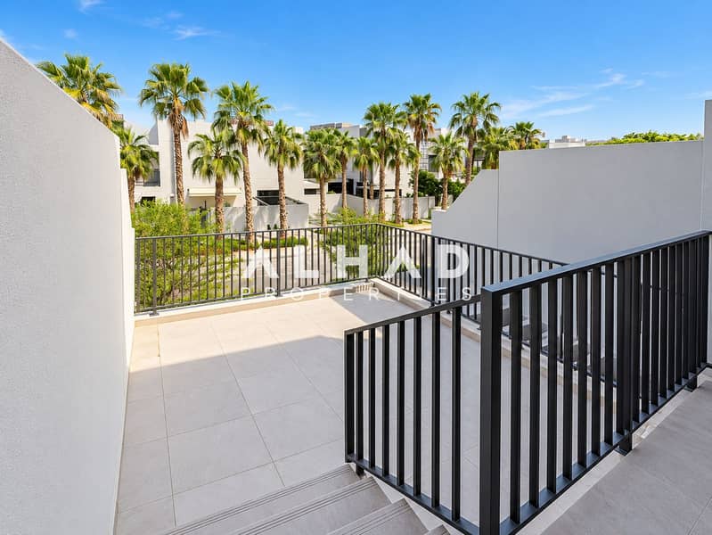 9 Sunlit Modern Terrace with Palm Views. png