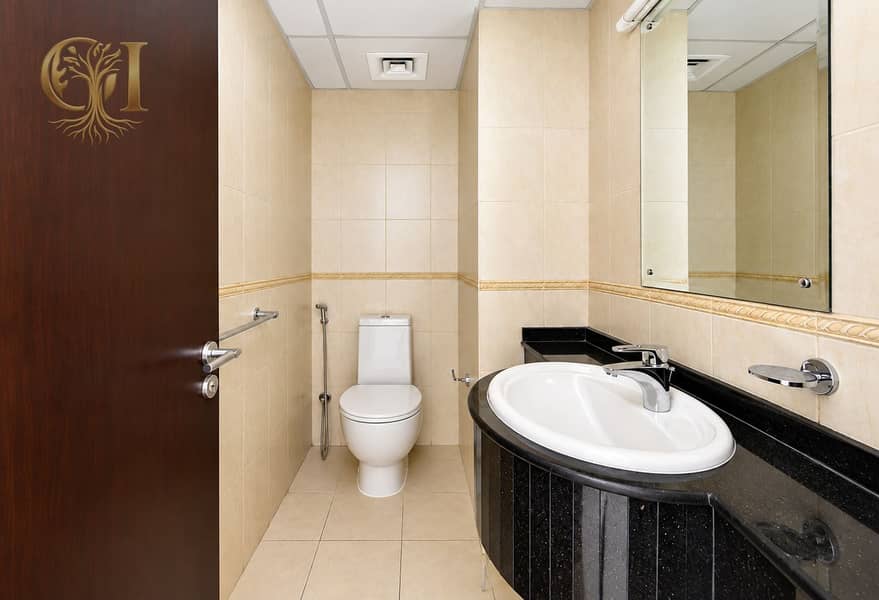 13 Modern Beige Tiled Bathroom Interior. png
