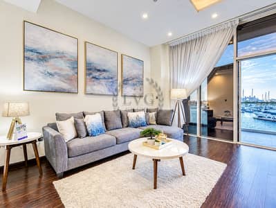 شقة 1 غرفة نوم للايجار في نخلة جميرا، دبي - Modern Living Room with Marina View. png