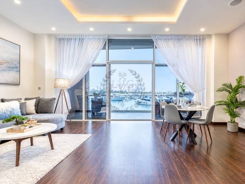 6 Luxurious Marina-View Living and Dining Room. png