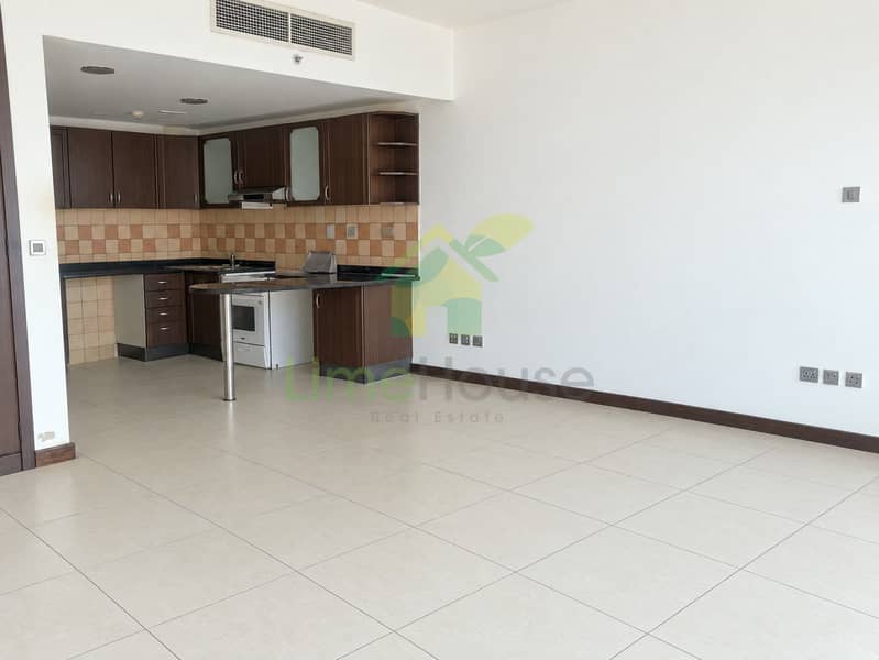 8 dubai-indigo-tower-jlt-studio-apartment-living-room-kitchen-02. jpg