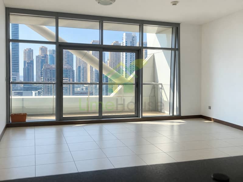 9 dubai-indigo-tower-jlt-studio-apartment-living-room-balcony-view-01. jpg