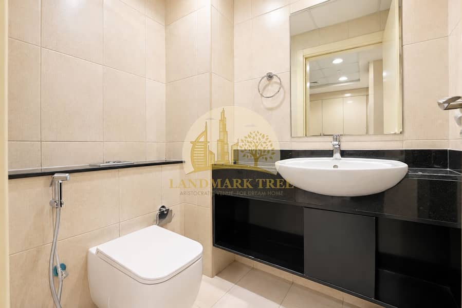 8 Modern Beige and Black Bathroom. png