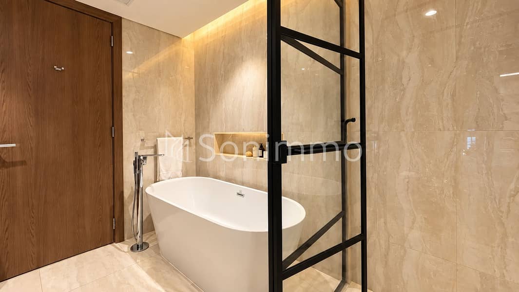 18 Warm Modern Luxury Bathroom with Freestanding Tub. png