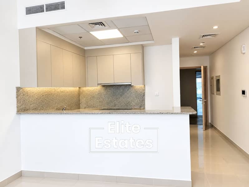 6 Minimalist Apartment Kitchenette Interior. png
