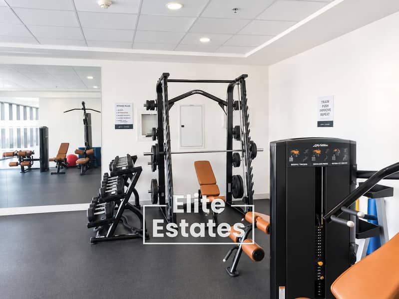 12 Spacious Modern Gym Equipment Interior. png