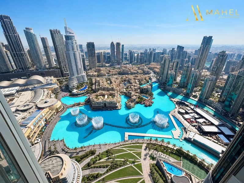 2 Dubai skyline over turquoise fountain lake-5. png