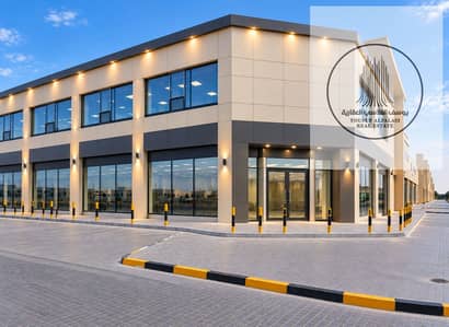 Showroom for Rent in Al Jurf, Ajman - Modern Beige and Gray Commercial Complex. png Showroom for Rent in Al Jurf, Ajman - Modern Beige and Gray Commercial Complex. png