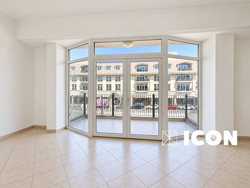 2 Bright polished room with Dubai balcony view. png