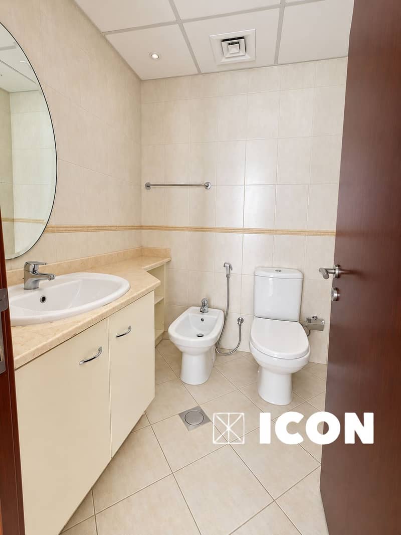 12 Bright, pristine luxury bathroom listing. png
