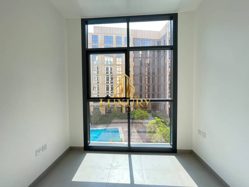 15 Spacious 1 BHK with Pool View | AED 42,999 | 4 Yearly Installments
