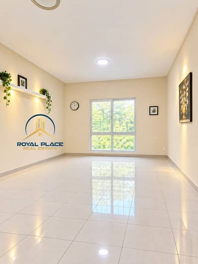 1 Bedroom Flat for Sale in Discovery Gardens, Dubai - Minimalist Sunlit Living Room. png