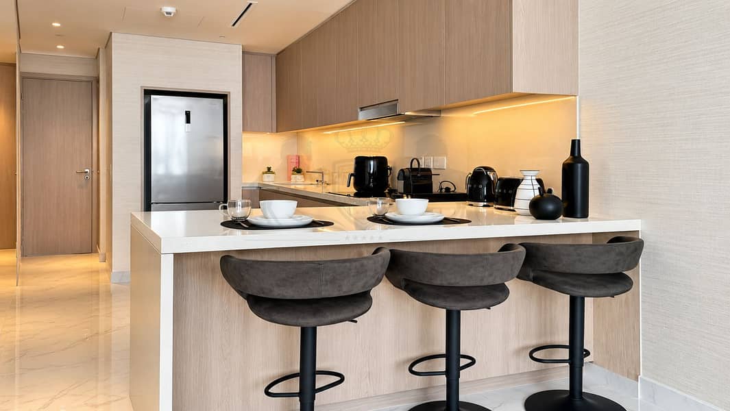3 Modern Greige Kitchen with Breakfast Bar. png