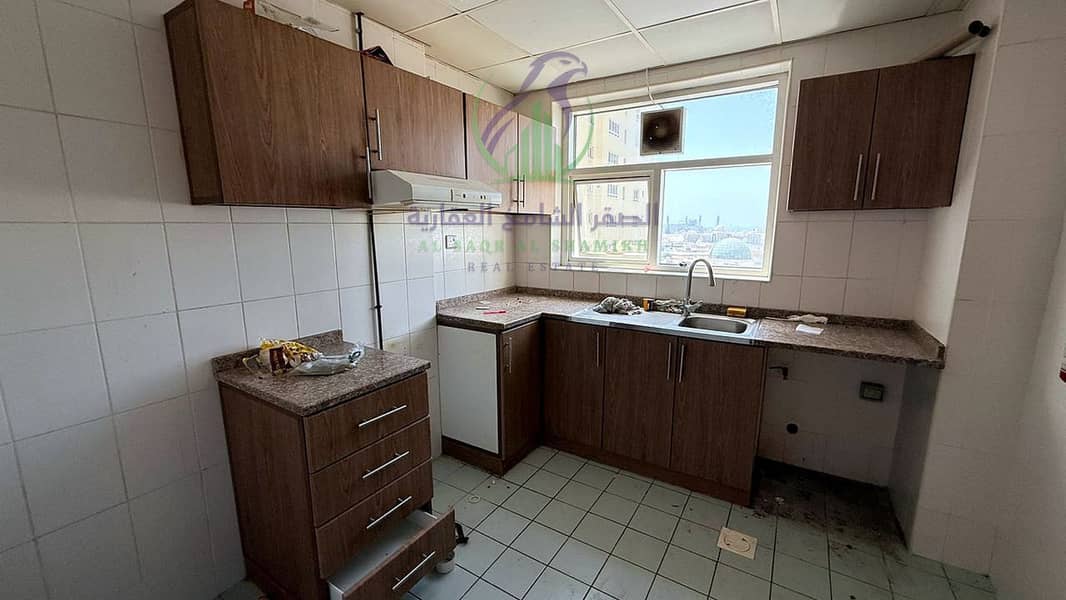 9 apartment-for-rent-2-bedroom-altaawn-alsharqh-kitchen-10. jpg