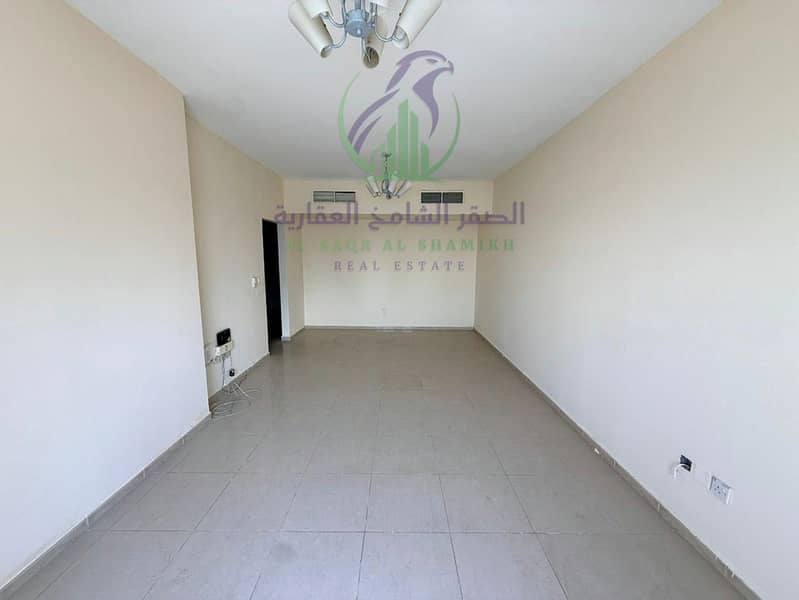 4 apartment-for-rent-3-bedroom-altaawn-alsharqh-living-room-05. jpg