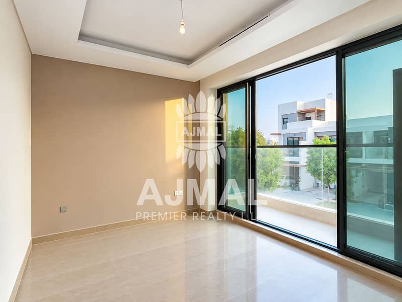 15 Sunlit Modern Room with Balcony Views. png