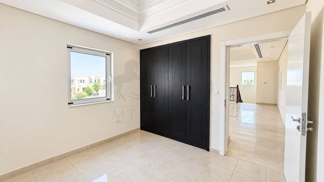 5 Bright Minimalist Bedroom with Wardrobe and Hallway. png