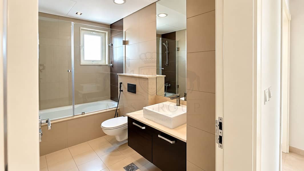 15 Modern Beige and Dark-Wood Bathroom. png