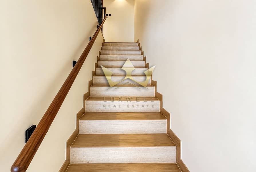 4 Modern Staircase in Warm Neutral Tones. png