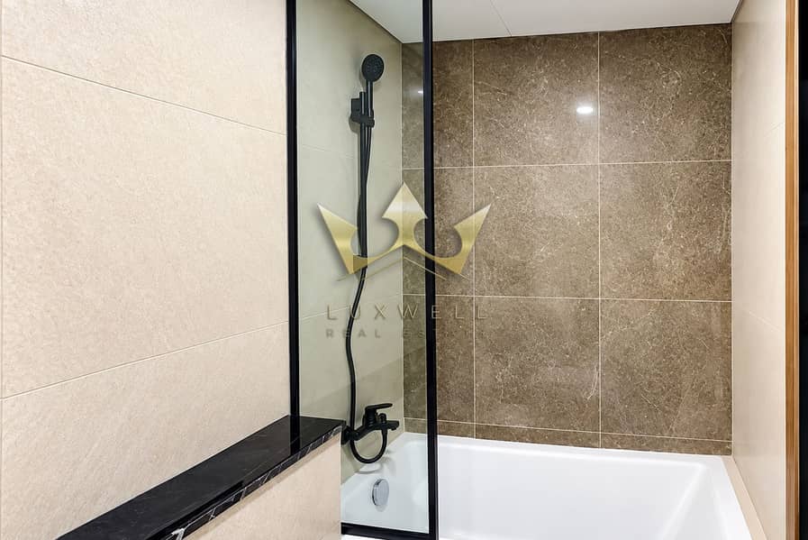 8 Modern Black-Framed Glass Shower Bathtub. png