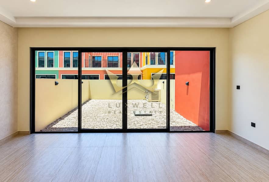 14 Sunlit Modern Room and Colorful Courtyard. png