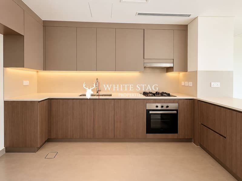 5 Modern Minimalist Taupe Kitchen. png