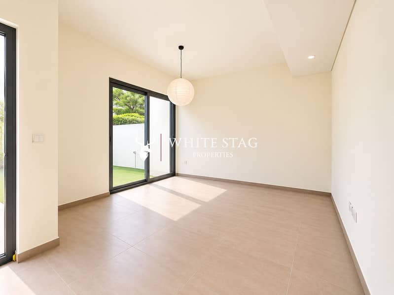 3 Bright Minimalist Room with Garden View. png