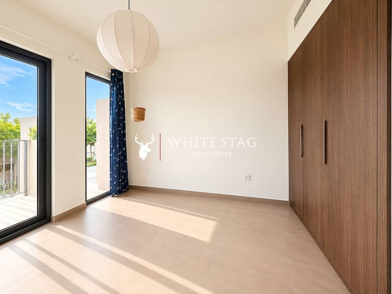 10 Bright Minimalist Bedroom with Sunlit Tiles. png